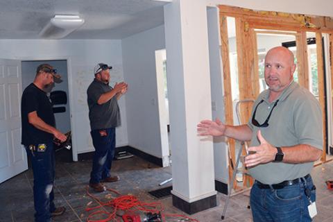Photos by Penny Ray/pennyray@cherokeescout.com Cherokee County Manager Randy Wiggins discusses renovation plans for a backup emergency 911 center on Marks Drive. 