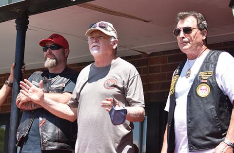 Don Slifer (middle, holding mask) thanks participants for coming out to a Toys for Tots fundraiser in August at Ronnie’s in Andrews.