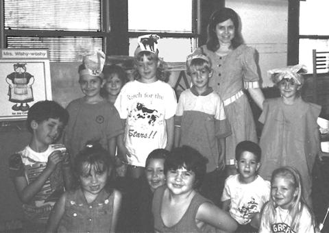 One of Linda Holcomb’s fond memories was when her Andrews Elementary School class acted out the Mrs. Wishy Washy book in 1995. The children’s hats have pictures of who they were in the “readers theater” to have fun with the content of the book. 