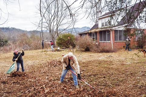 Phil Roche/For the Cherokee Scout Local members of the Combat Veterans Motorcycle Association were in Andrews on Saturday morning working on a veteran’s home that needs cleaning and repairs.