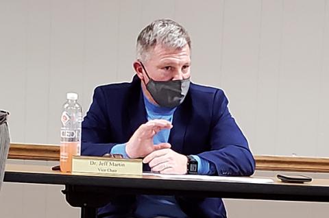 School board member Jeff Martin stresses the importance of maintaining safety measures when students return to in-person instruction for four days a week.