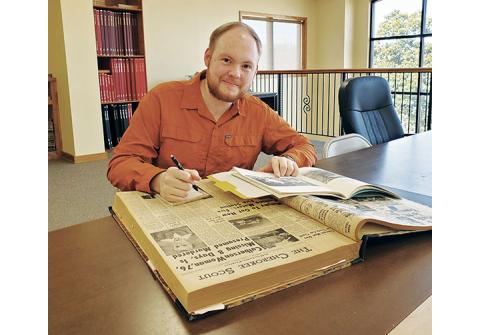 Stacy Van Buskirk/ svanbuskirk@cherokeescout.com Silas Shields of Culberson searches through archives at the Cherokee Scout looking for information about his great-great grandmother, Lou Emma Shields, who went missing in 1963.
