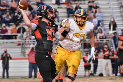 BT Douthit/Contributing Photographer Murphy lineman Yousef Mugharbil bears down on Rosman quarterback Tyler Stamey in the Bulldogs’ victory.