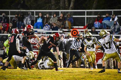 Andrews' Isaac Weaver breaks through the Hayesville defense.