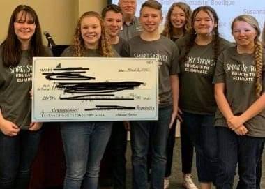 Tonia Forrister/Contributing Photographer Students in the MHS/TCEC AIG Team won first place and top monetary prize for their pitch of the self-destructing single-use syringe the team invented. The team includes (from left) Elexus Graves, Bria Haines, Lyden Raxter, Jonah Hardin, Trista Allison, Trinity Mickens and CeCe Ward.