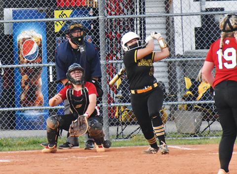 Justin Fitzgerald/sports@cherokeescout.com Murphy senior Annie Kate Dalton watches the first of her two seventh-inning homeruns go over the fence during the Lady Bulldogs’ 20-2 win over Andrews.
