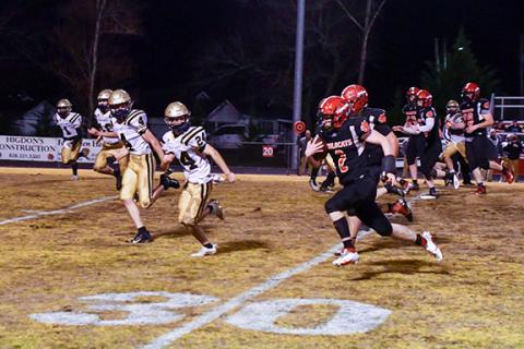 Phil Roche/For the Cherokee Scout Sophomore running back Gavin Weaver carries the ball for Andrews against Hayesville on March 19. The Wildcats lost to Elkin on Friday 35-28 in the first round of the state playoffs.