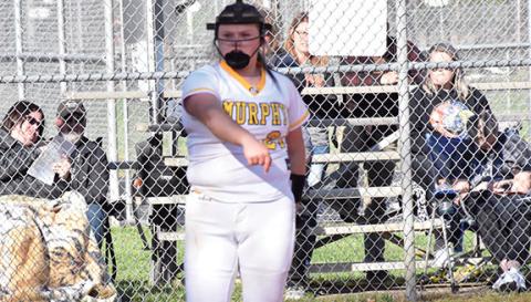 Justin Fitzgerald/sports@cherokeescout.com Murphy pitcher Jersey Schwalm throws to first in the top of the seventh inning of the Lady Bulldogs’ 2-0 win over Rosman on Thursday. Schwalm threw a complete-game shutout and struck out 10 batters in the win.