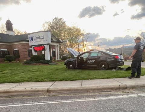 Andrews police Officer Coyle Olsen jumped a curb last week and wrecked a patrol car. 