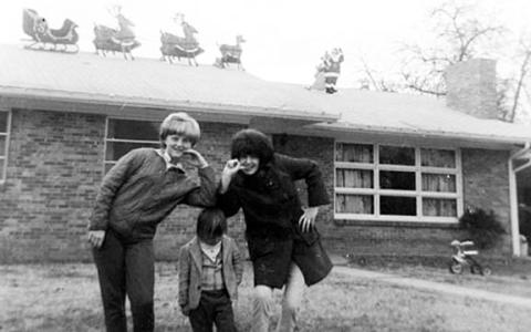This is the picture of the home Ruby and Harold Curtis built on Happy Top in 1958. In the photo (from left) are Freida Ladd, a neighborhood friend, Marilyn Curtis and Steve Curtis (front).   