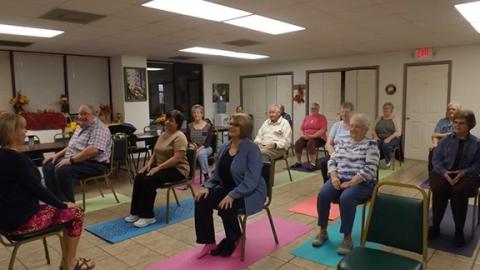 Peggy Graham/Contributing Photographer  Seniors at Penland Senior Center enjoy yoga pre-pandemic. Senior centers in Andrews, Hiwassee Dam, Murphy and Unaka are reopening Monday.