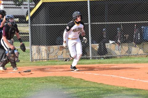 Justin Fitzgerald/sports@cherokeescout.com Murphy senior Dawson Hensley breaks out of the batters’ box during Murphy’s 6-3 win over Swain County on May 21.