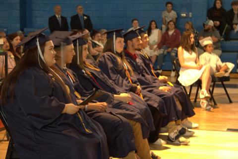 Charlie Benton/cbenton@cherokeescout.com The six members of the Nantahala School Class of 2021 in their seats at the school’s graduation on the evening of May 21. 