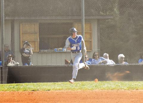 Hiwassee Dam’s Clay Davis legs out a base hit during the Eagles’ 10-9 win over Robbinsville on April 27.