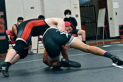Justin Fitzgerald/sports@cherokeescout.com Andrews wrestler Sam Wood battles with Robbinsville’s Ben Wachacha in a 220-pound bout during the May 4 dual meet, which the Black Knights won 78-6.