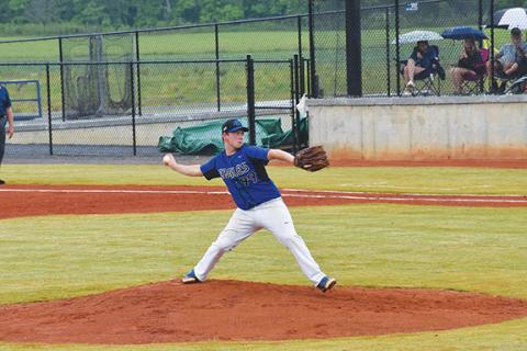 Justin Fitzgerald/sports@cherokeescout.com Hiwassee Dam’s Michael Simms in the middle of his windup while pitching in the Eagles’ 12-11 loss to Hayesville on June 3. Simms pitched 3 1/3 innings and went 3-4 at the plate in the game.
