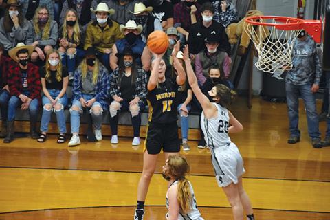  Noah Shatzer/Cherokee Scout Murphy’s Torin Rogers takes a jump shot during the Lady Bulldogs’ 49-37 win over Robbinsville on Feb. 27. Rogers has committed to play basketball at the University of Richmond.