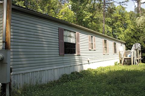 Charlie Benton/cbenton@cherokeescout.com A Cherokee County woman has reclaimed her home with help from Four Square Community Action, which is based in Andrews.