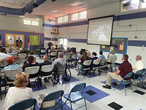 David Brown/dbrown@cherokeescout.com The Oaks Academy held three different graduation ceremonies on May 26 – at 10 a.m., 11 a.m. and noon – at Cherokee County’s alternative school in Marble. Graduates and members of the audience listen to an inspirational pep talk introduced by Principal Mickey Noe during the 11 a.m. graduation.