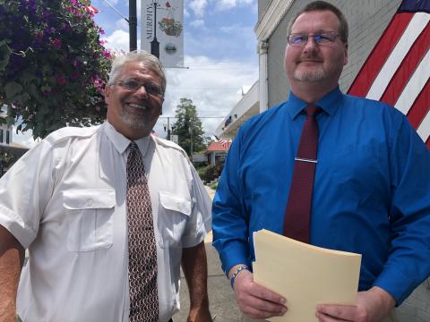 (From left) Andrews Mayor James Reid and Tim Radford, owner of WKRK