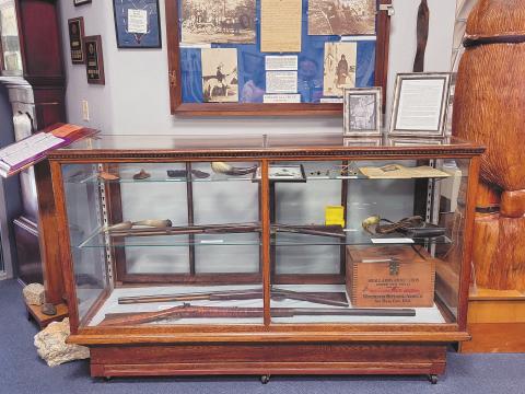 The display for Hoke Mashburn's handcrafted guns and bullets is at the Cherokee County Historical Museum in Murphy.