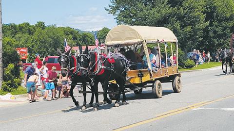 Stacy Van Buskirk/svanbuskirk@cherokeescout.com  Tradition continues: The 64th annual Western North Carolina Wagon Train ended its weeklong festivities by parading through Main Street in Andrews on Saturday. There was a full day of fun for all ages in both Andrews and Murphy in celebration of Independence Day. More photos next week.
