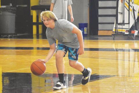 Ryland Chambers works on his right hand dribbling.