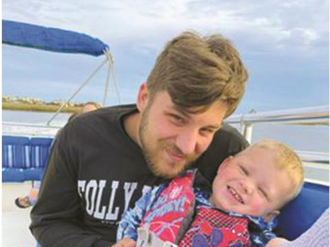 Aaron Howard and his 2-year-old son, Hudson, survived a shooting last week. 