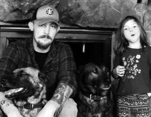 Zach Shivers and his daughter Reagan with their dogs, Bowie and Fin. 