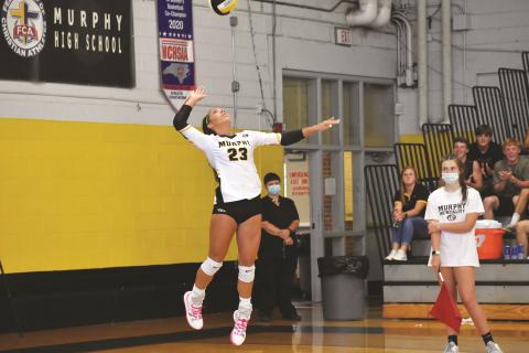 Murphy junior Olivia Payne goes up for a serve during the Lady Bulldogs’ 3-1 win over Highlands on Aug. 19. Murphy beat Tallulah Falls and Franklin last week to move to 3-0 this season.