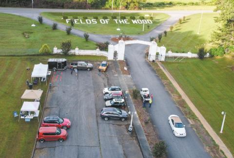 An overhead view of the Tri-state MINIs Group Poker Run on Saturday at Fields of the Wood.
