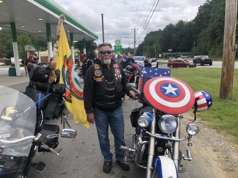 Michael Hutton, Captain America, riding his brother’s bike, who died on the trail in 2017.