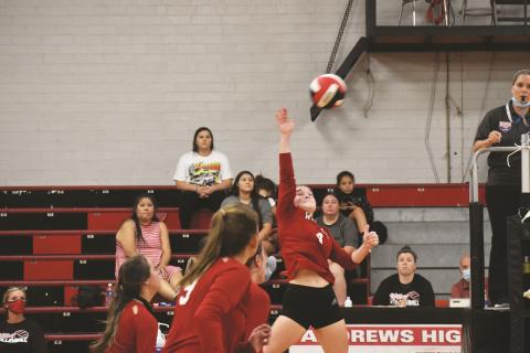 Andrews senior Brooke Phillips tries to get the ball over the net during the Lady Wildcats’ 3-0 loss to Murphy on Sept. 14.