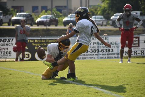 Cat Barreiro kicks an extra point during the Murphy football team’s scrimmage against Erwin on Aug. 13.