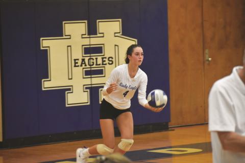 Hiwassee Dam’s Riley Payne prepares to serve the ball during the Lady Eagles’ five-set loss to Andrews on Aug. 24.
