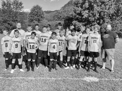 Murphy Middle School has its first boys soccer team this fall. Back row (from left) are coach Ken Ennis, Andrew White, Elijah Twiggs, Kole Ritz, Cale Harger, Joseph Gibby, Aaron Harger, Abram Twiggs, coach Justin Butler. Front row (from left) are Brodie Betts, Gavin Breitenbach, Jaden Rice, Nathan Johnson, Aiden Cales, Dathan Hartness, Jerry Bui, Landon Ennis, Tyler Payne. Not pictured are Mason Gaither, Jack Dockery, Keaton Ritz and Hayden Blanton.