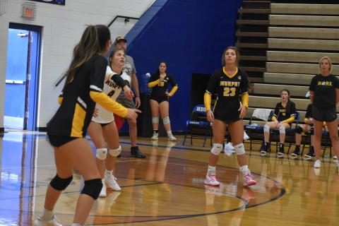 Murphy senior Ashlyn Stroupe (4) looks to pass the ball as junior Olivia Payne (23) looks on during the Lady Bulldogs’ 3-0 win over Hiwassee Dam on Thursday.
