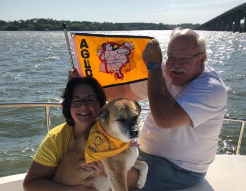 Theresa Gaffney (left), Tim Gaffney and their dog, Lucy, during their 2018 Great Loop expedition, circumnavigating the eastern half of the United States by boat. Tim Gaffney recently died after a lengthy battle with COVID-19 complications.