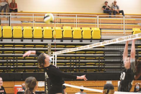 Andrews junior Rylie McDonalds looks to hit the ball over the net during Andrews’ four-set loss to Hayesville on Aug. 31.