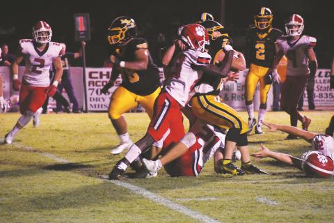 Murphy’s Hunter Stalcup is stood up by Rabun County’s Willie Goodwyn during the Bulldogs’ 59-14 loss to the Wildcats on Sept. 10.