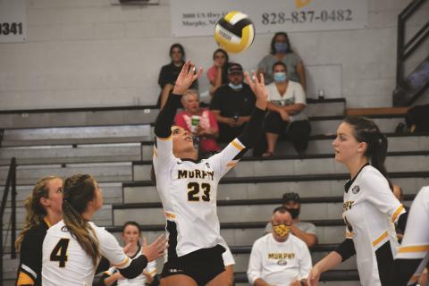 Murphy junior Olivia Payne sets the ball during the Lady Bulldogs’ 3-0 win over Hayesville on Sept. 2.