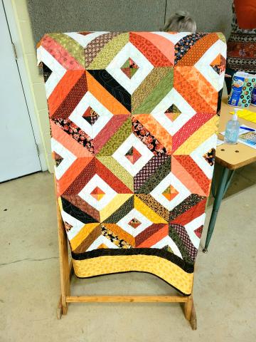 This quilt will be raffled off to raise funds for the Brasstown Community Center until Thanksgiving when the winner will be announced during the Brasstown Community Center Thanksgiving Potluck. Raffle tickets are $1 for 1 ticket or 6 for $5 and will be available for purchase at Carolina Crafting in Murphy.