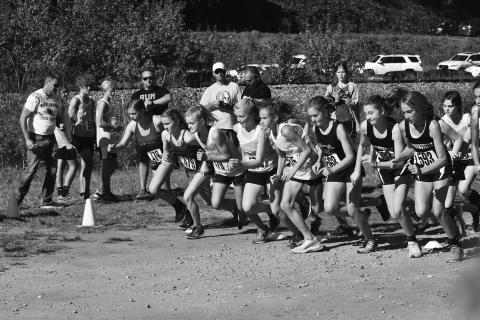 The Murphy middle school girls and Martins Creek’s Fern Crayton take off at the start of the girls’ race.