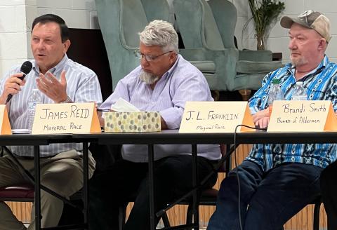 From left, Randy Hogsed, incumbent Mayor James Reid and J L Franklin at a candidate meet and greet Saturday in the Andrews Community Center. Hogsed and Franklin have challenged Reid for the mayor’s seat in the municipal election Tuesday, Nov. 2.