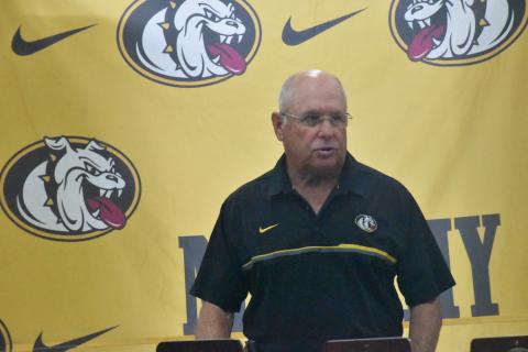 Former Murphy football head coach David Gentry addresses the audience at the event introducing new Bulldogs head coach Joseph Watson on June 10.