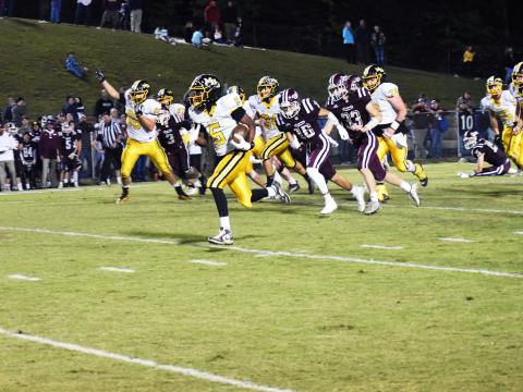 Murphy’s Juan Allen sees nothing but open field ahead during his 76-yard touchdown run in the Bulldogs 28-21 win over Swain County on Oct. 22.