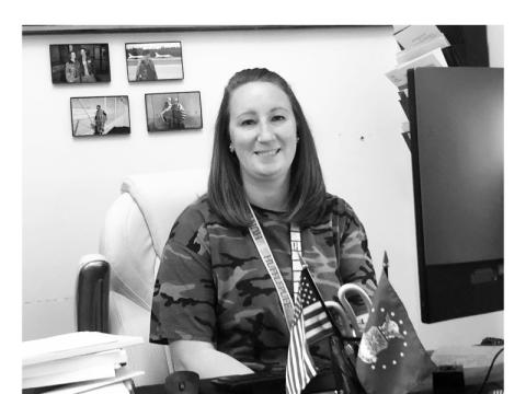 Dana Pash in her patriotic office at Cherokee County Veterans Services in the courthouse.