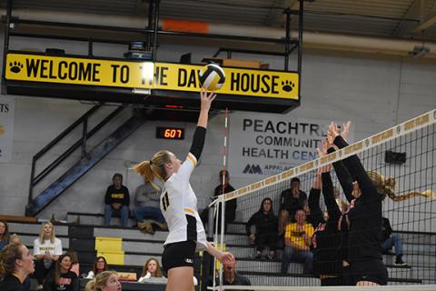 Murphy’s Torin Rogers tips the ball over the South Stanly block during the Lady Bulldogs 3-0 win on Oct. 26.