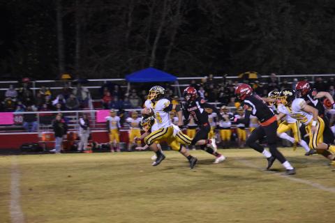 Murphy’s Ty Laney breaks free for a big run on the first play from scrimmage.