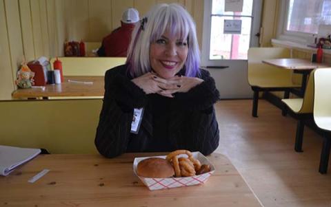 Abigail Hickman with her bountiful burgers from Burger Basket in Andrew.